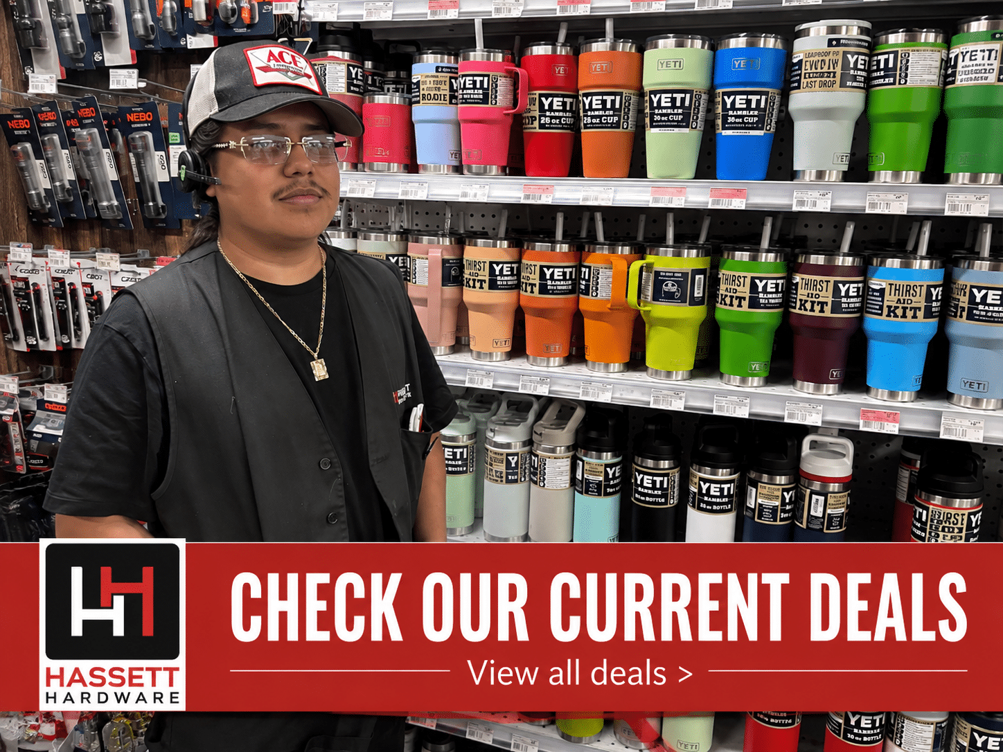 Red Hot Buy RHB image for website jose and yeti young man standing in front of shelves of Yeti products at a hardware store